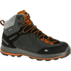 MEN'S WATERPROOF LEATHER HIGH TREKKING BOOTS - MT100
